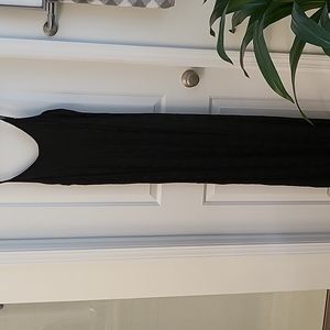 Gorgeous black maxi spaghetti strap dress with same colo floral accents.Sz Med.